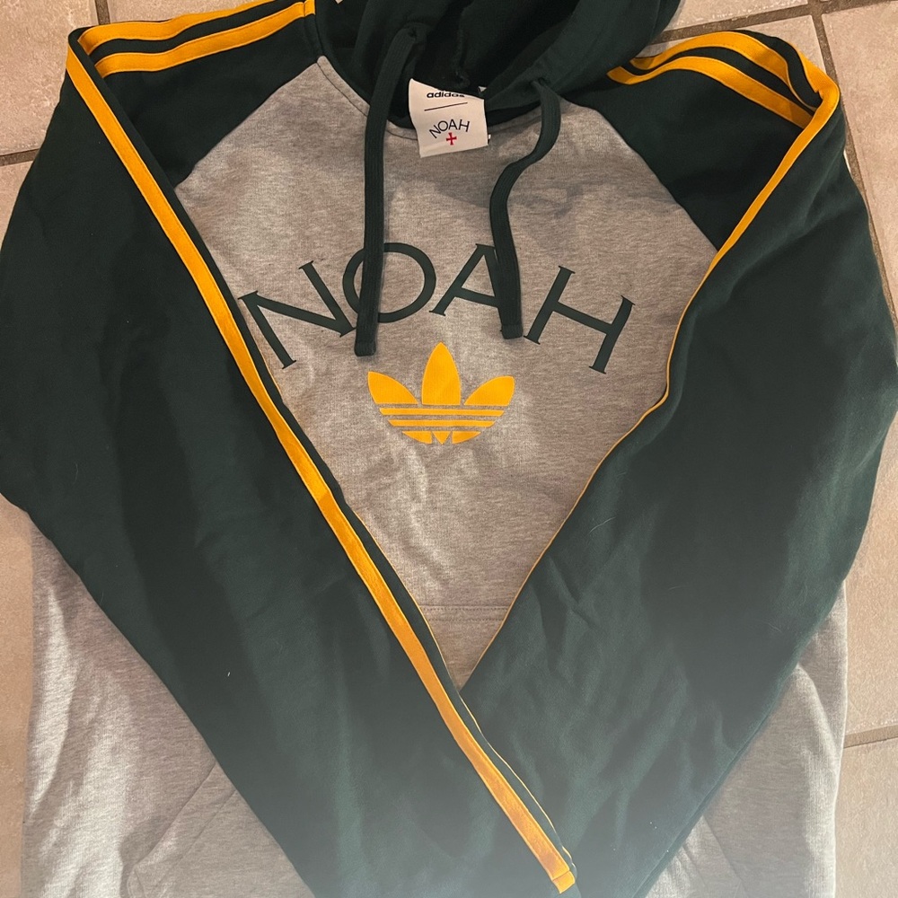 Adidas X Noah Unisex Gray and Dark Green Hoodie with Gold Accents